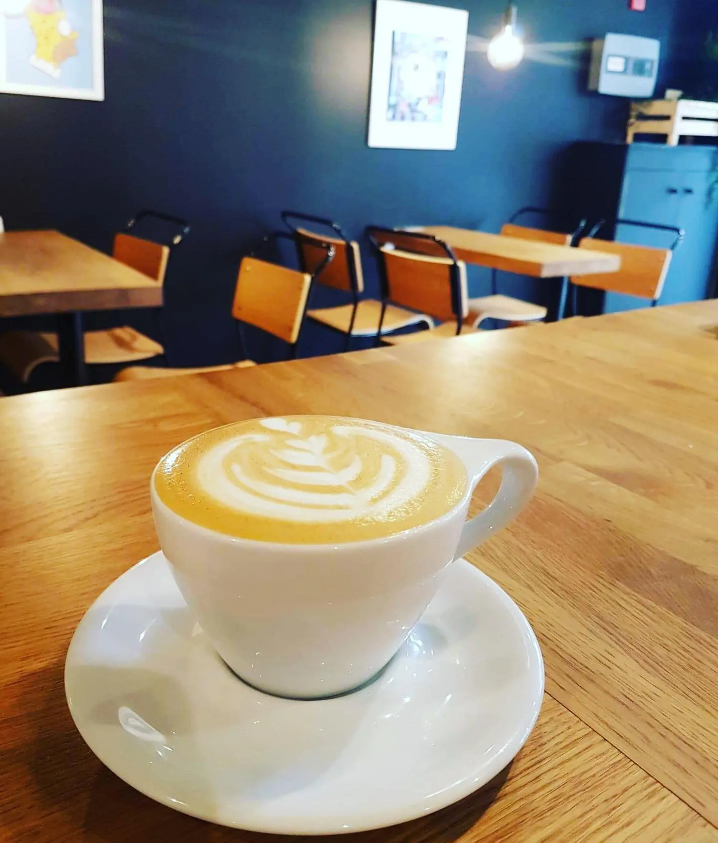 Latte art at the original Coyote Coffee and Donuts, Inverness