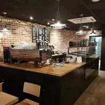 Original Coyote Burger restaurant interior on Academy Street, Inverness